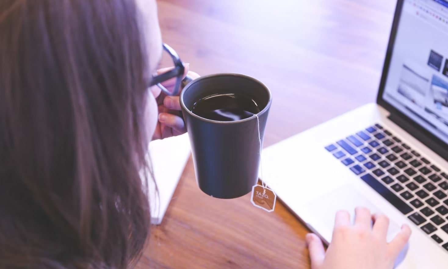 Women discussing lawsuit funding options while enjoying coffee